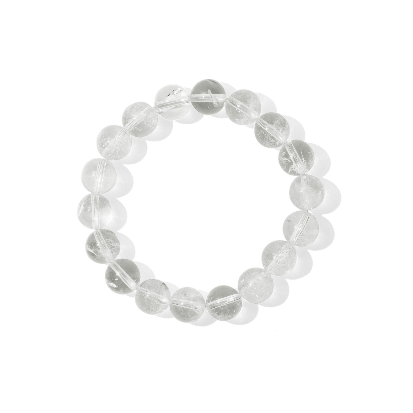 A single crystal gemstone bracelet made of crystal quartz. Fully transparent, shiny, and nearly colourless.