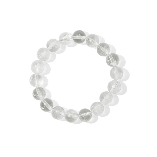 A single crystal gemstone bracelet made of crystal quartz. Fully transparent, shiny, and nearly colourless.