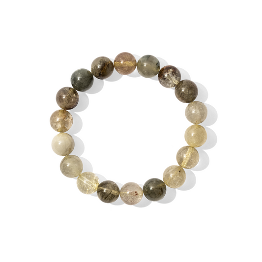 A single crystal gemstone bracelet made of green and gold rutilated quartz. A semi-transparent, shiny mix of moss green and golden tones containing striking gold and green crystals, or rutiles.