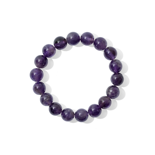 A single crystal gemstone bracelet made of amethyst. A semi-transparent, shiny deep purple.