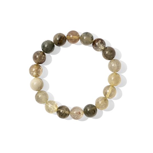 A single crystal gemstone bracelet made of green and gold rutilated quartz. A semi-transparent, shiny mix of moss green and golden tones containing striking gold and green crystals, or rutiles. 